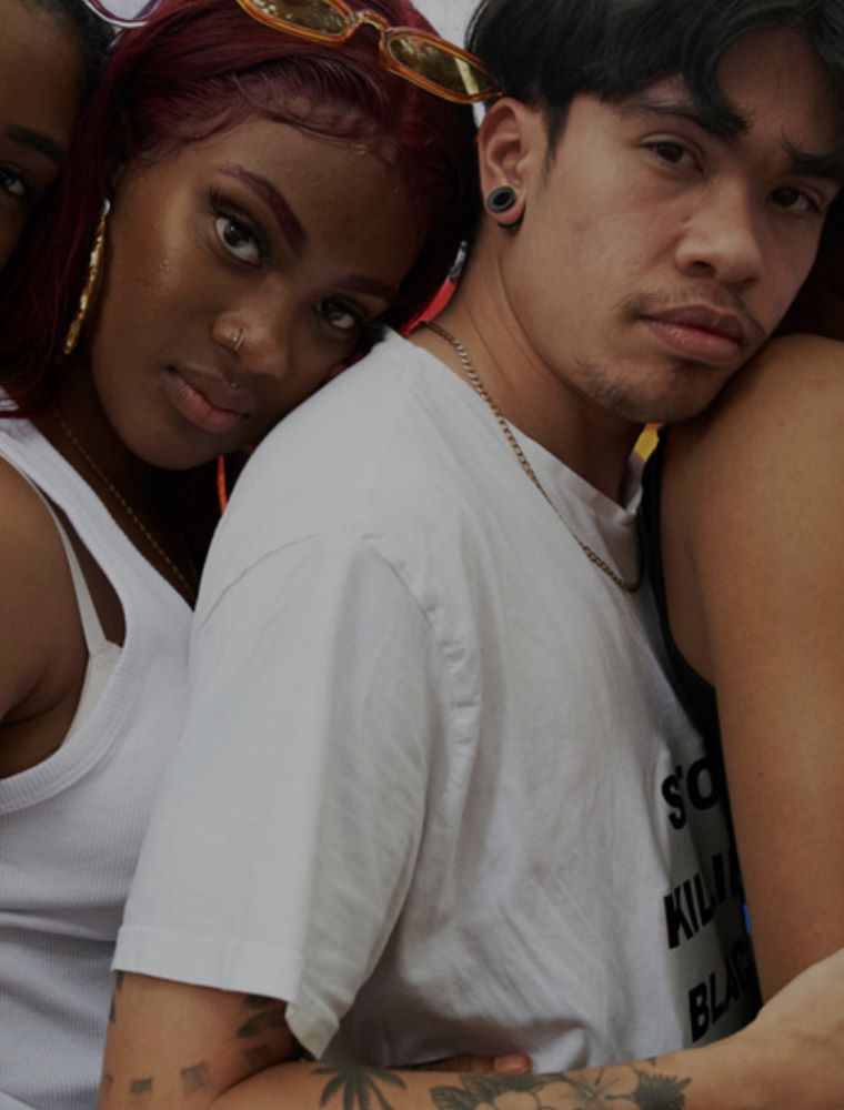 Two people standing closely together
